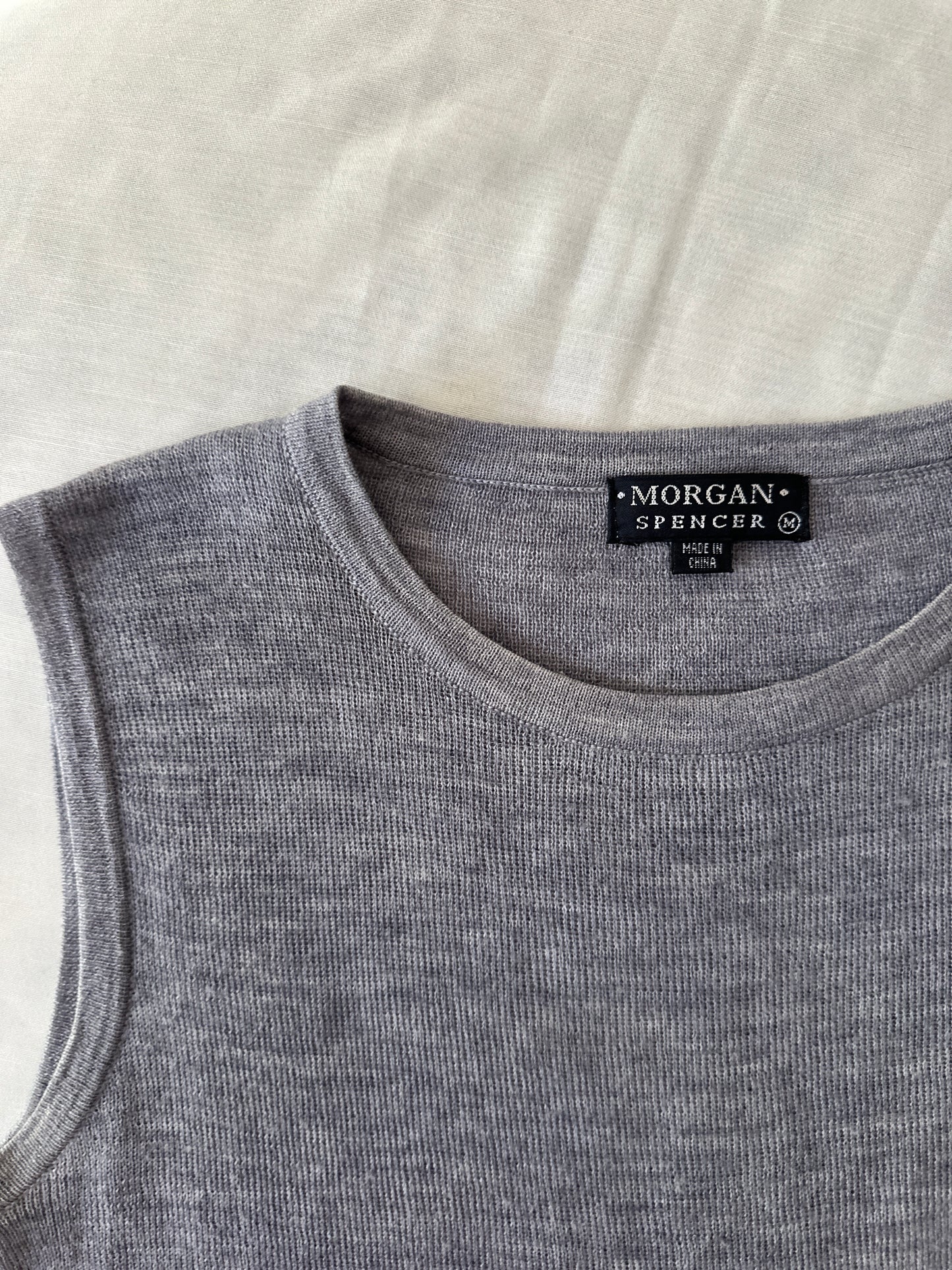 grey woollen vest