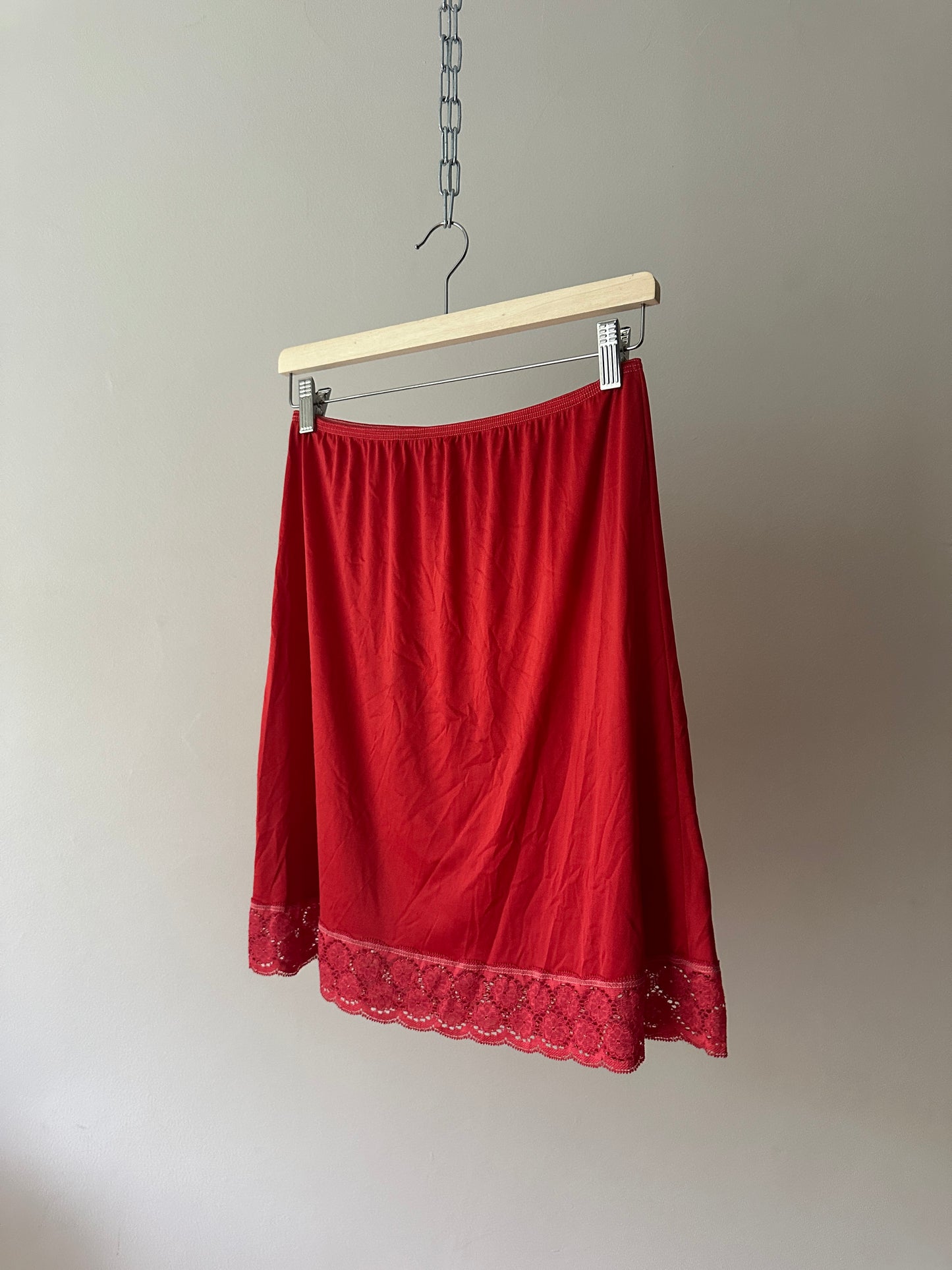 red dyed short slip skirt
