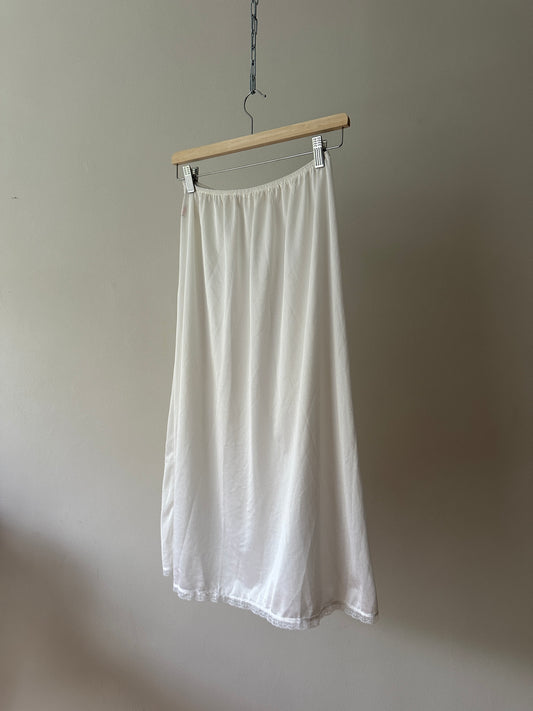 white mid-length slip skirt