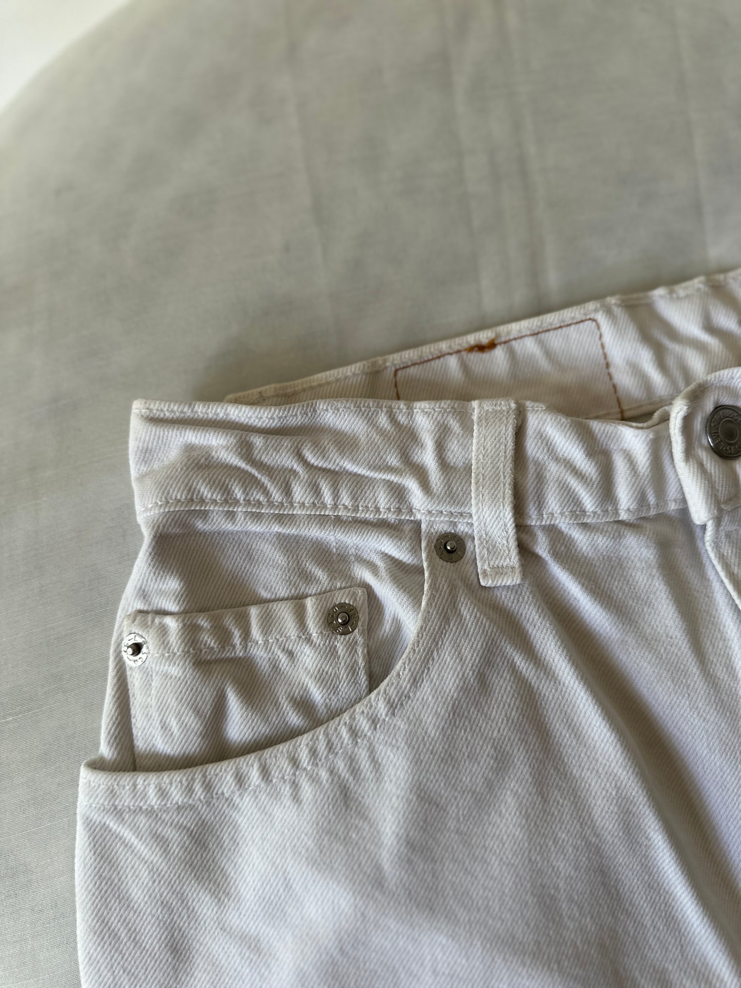 white Levi jeans