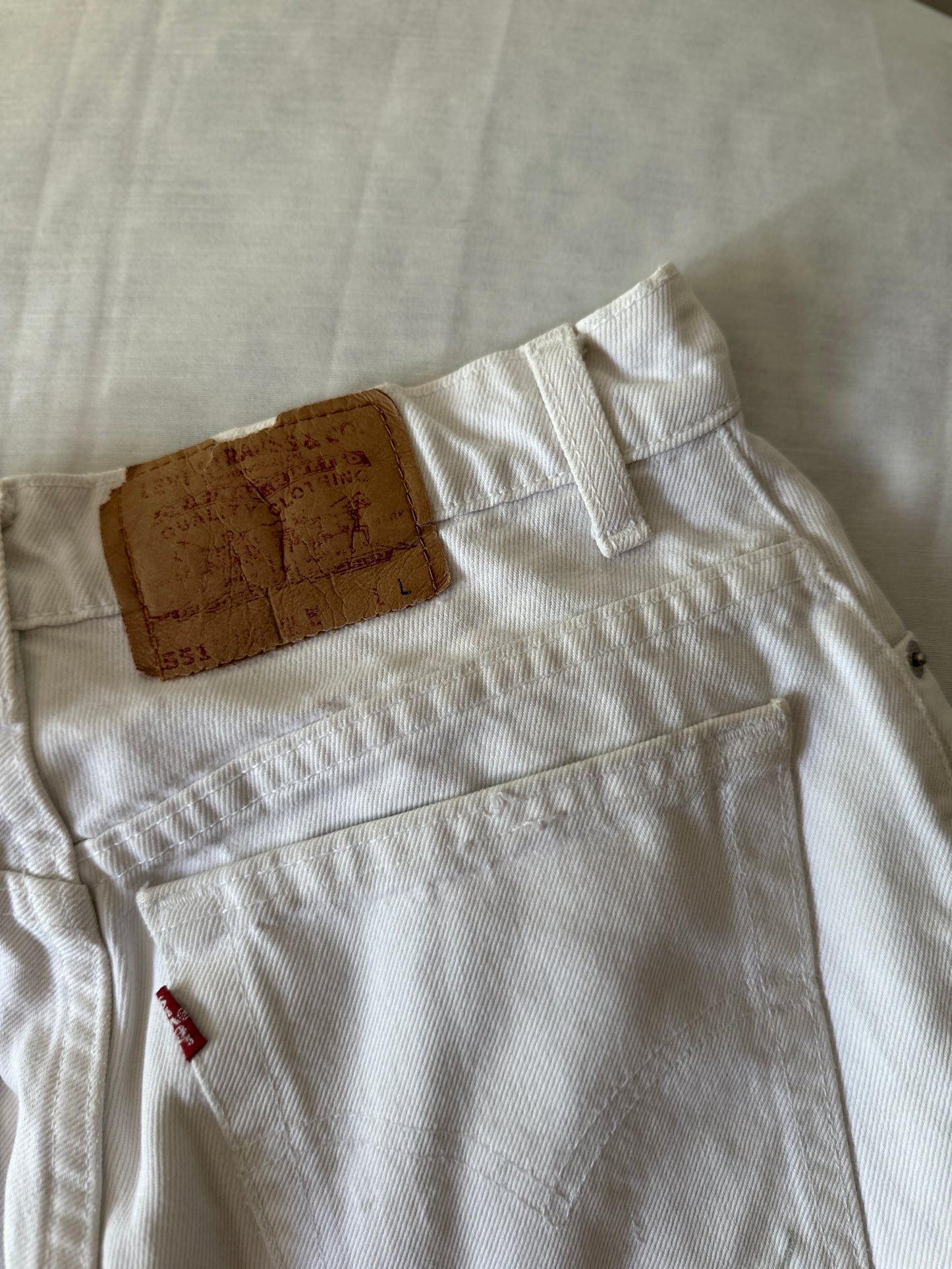 white Levi jeans