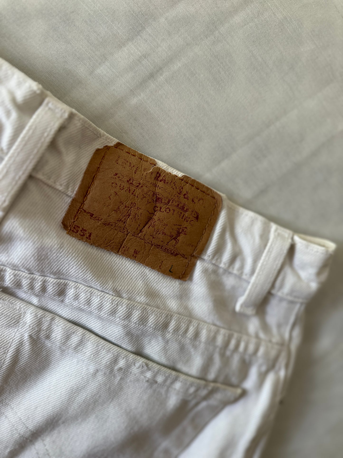 white Levi jeans