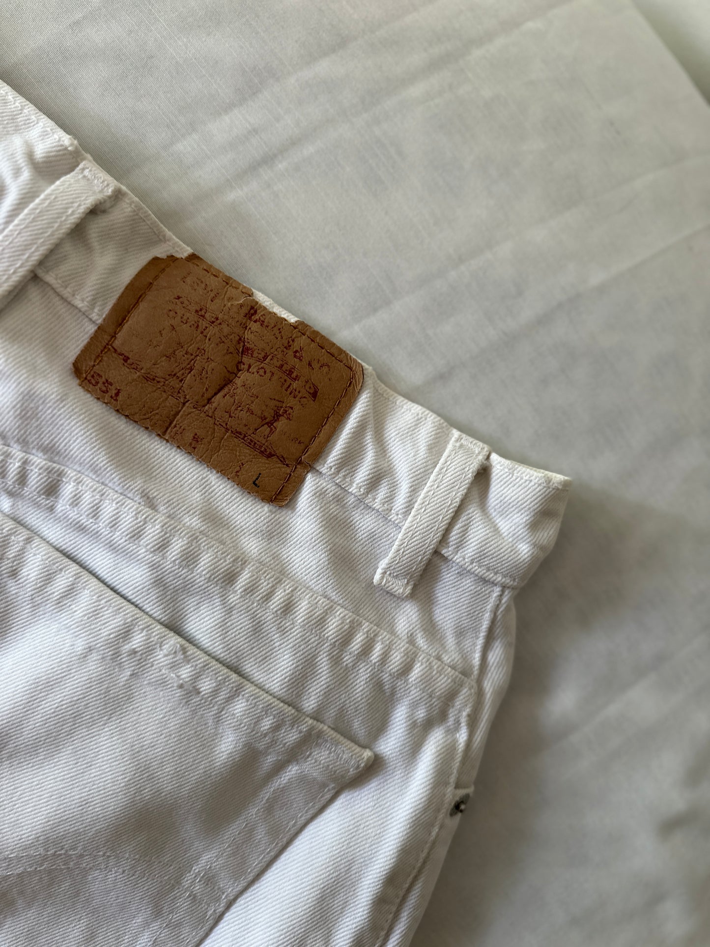 white Levi jeans