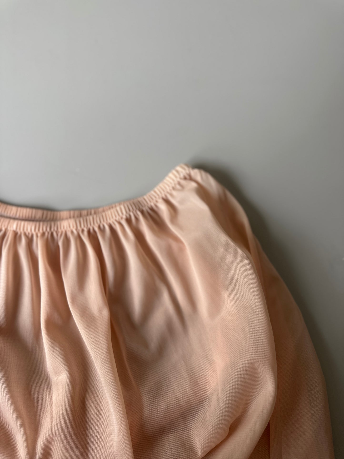 nude mid-length slip skirt