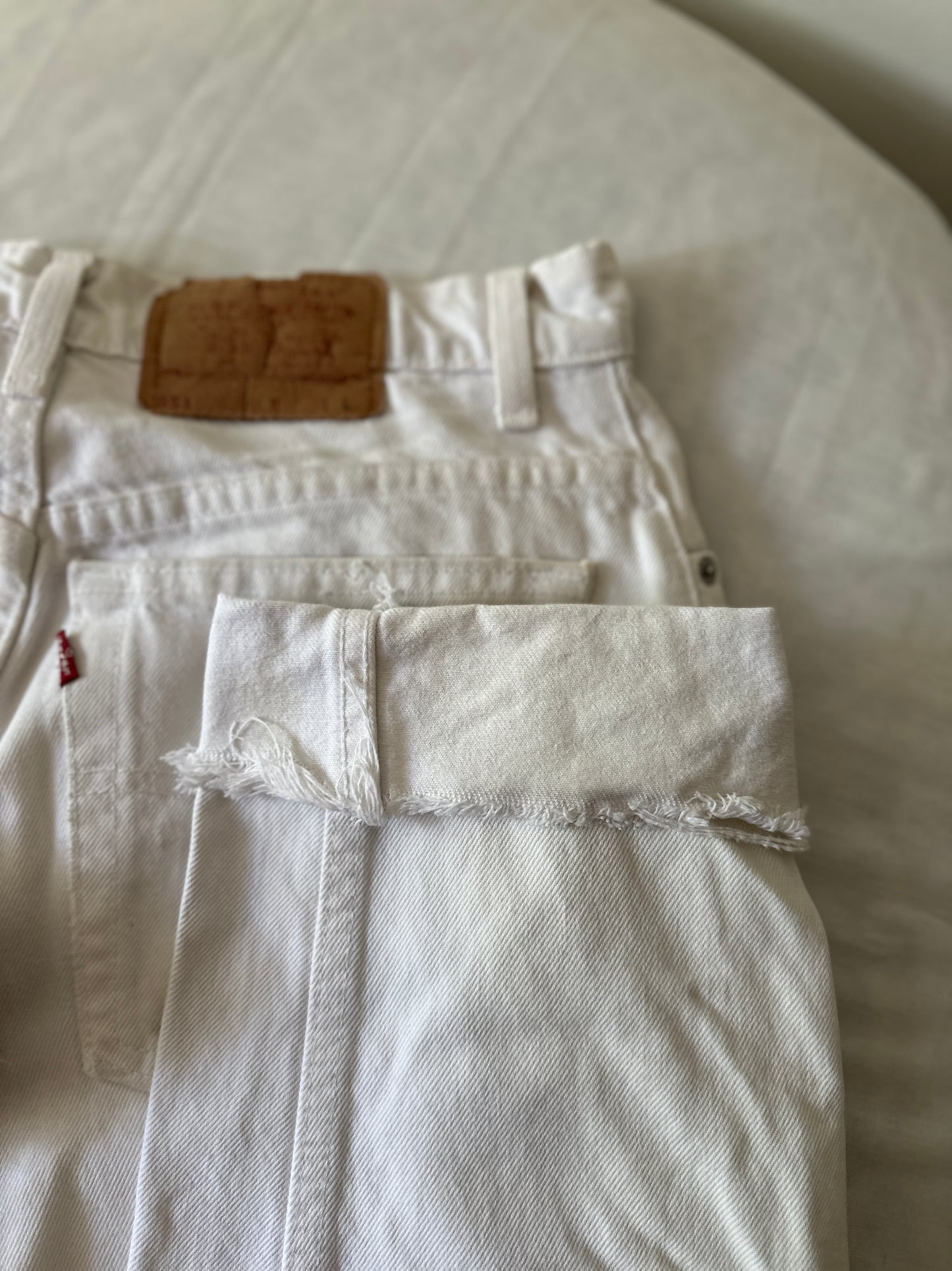 white Levi jeans