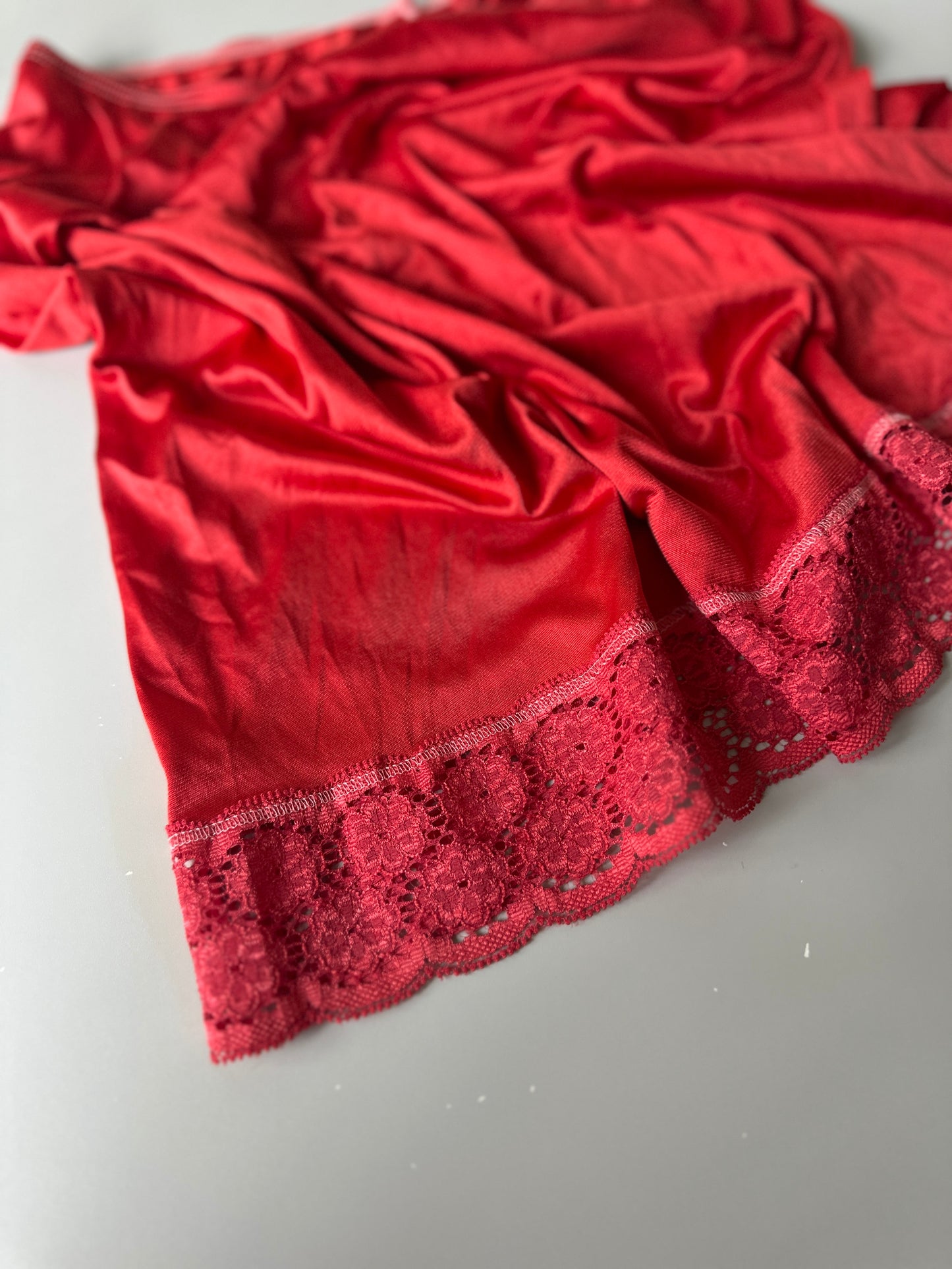 red dyed short slip skirt