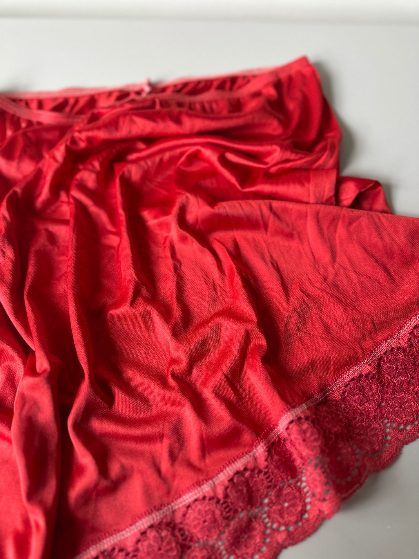 red dyed short slip skirt
