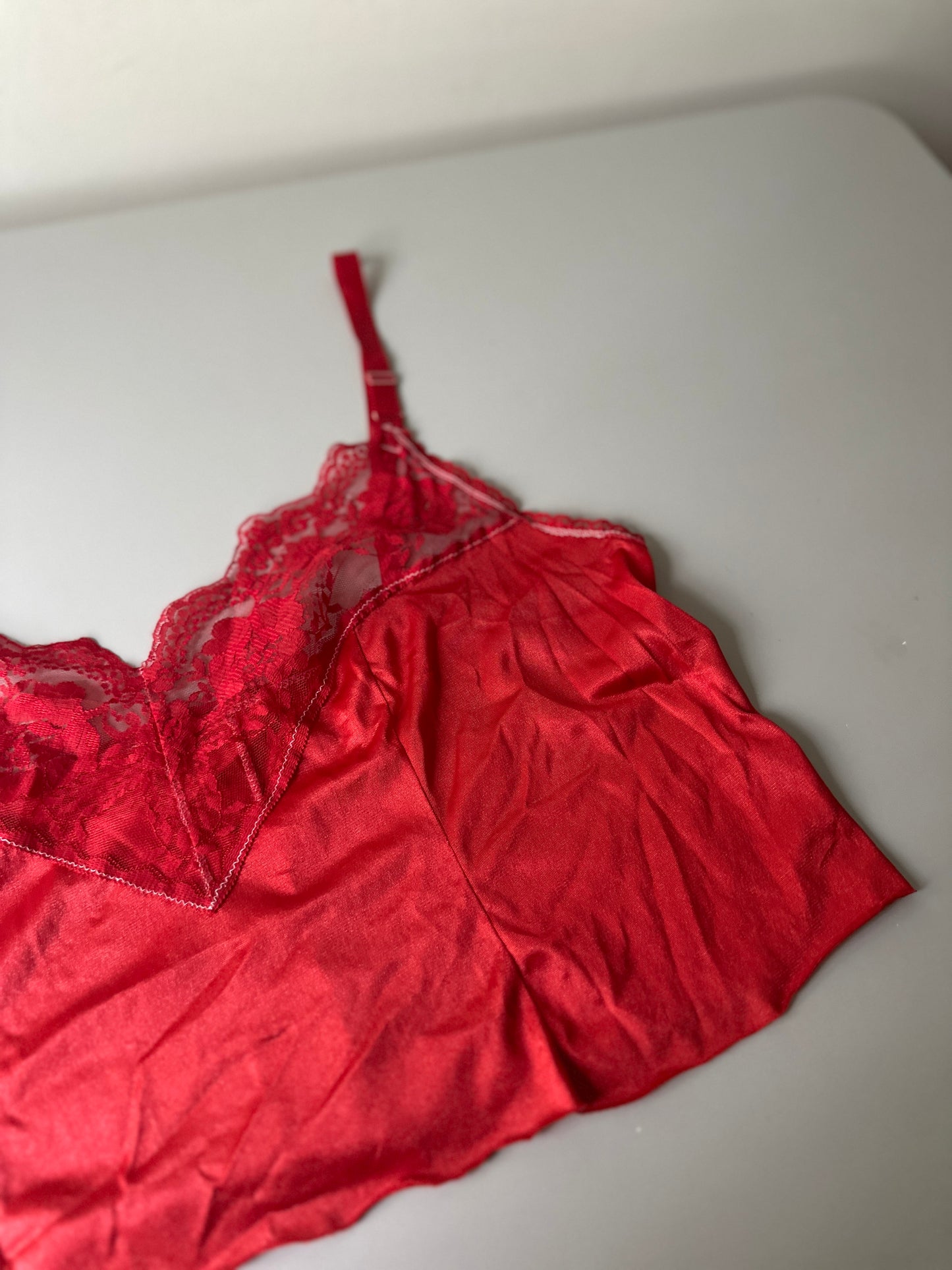 red dyed cut-off slip top