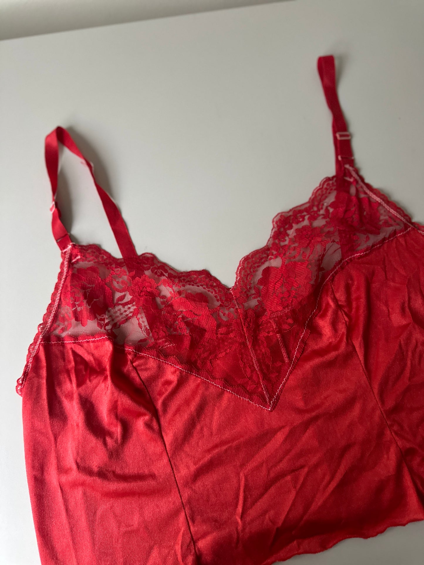 red dyed cut-off slip top
