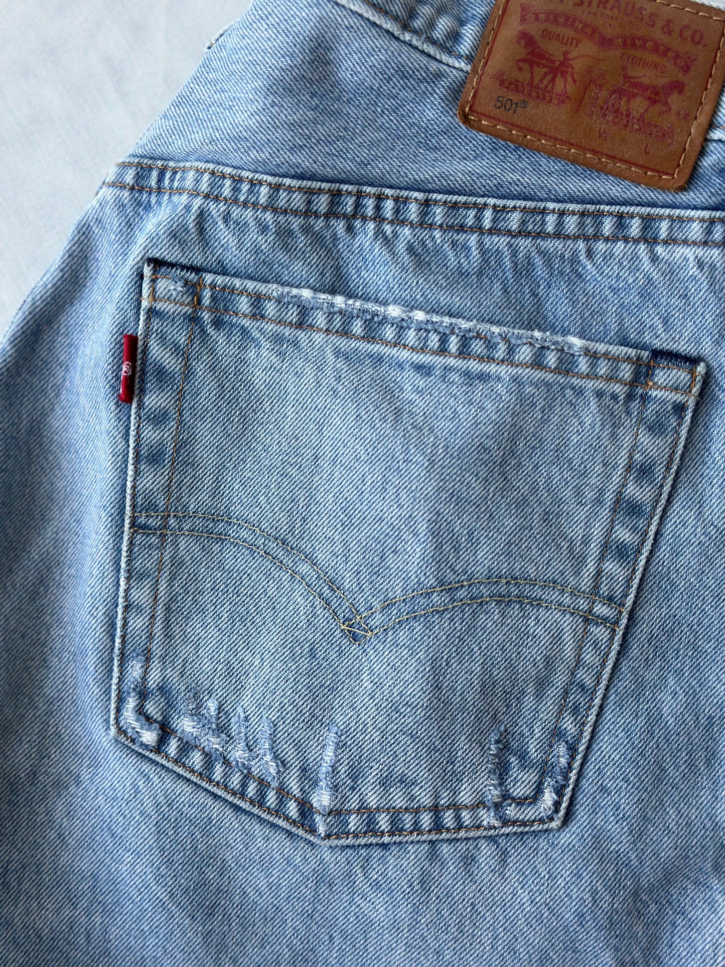 Levi ripped light blue jeans