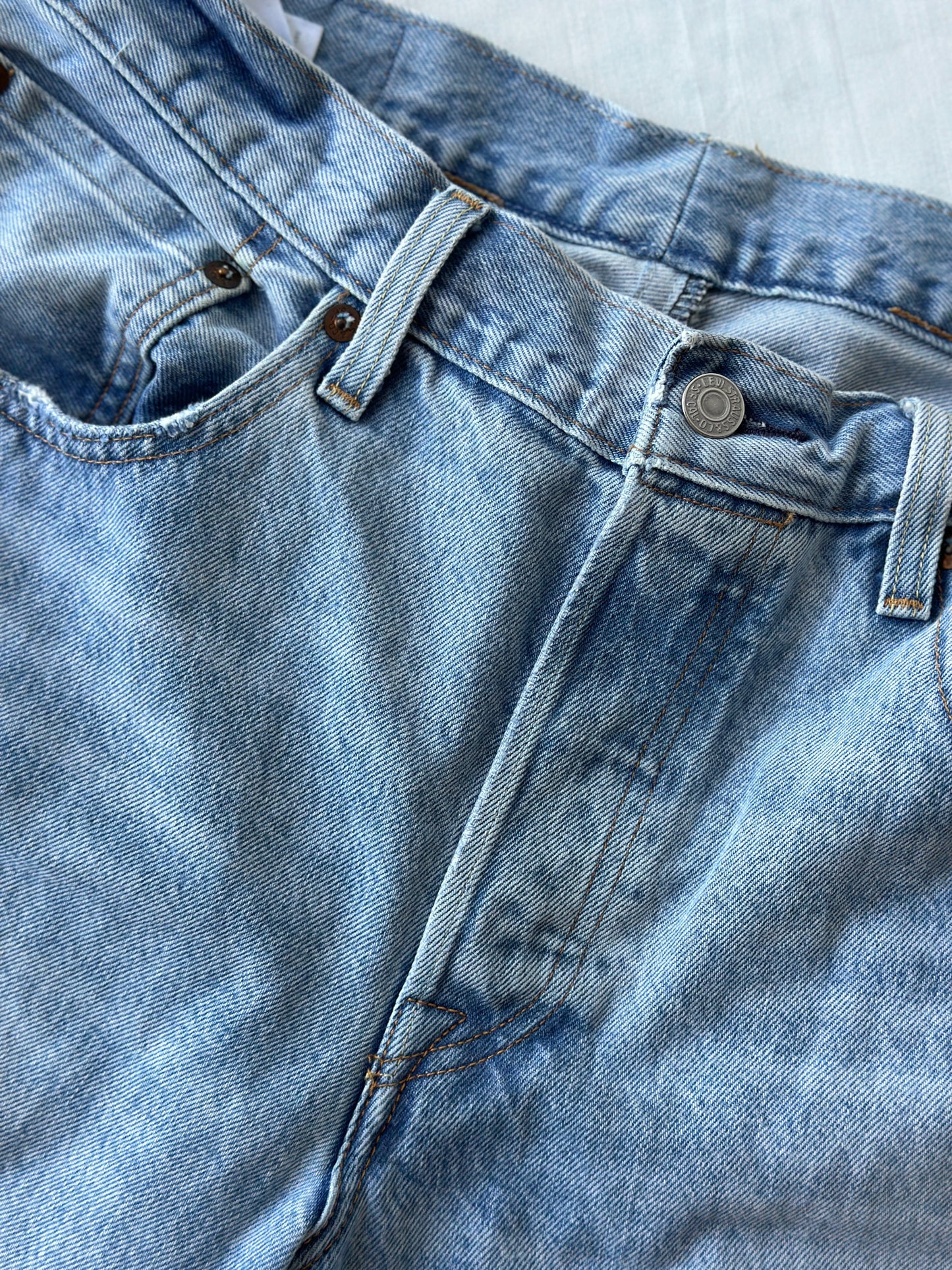 Levi ripped light blue jeans