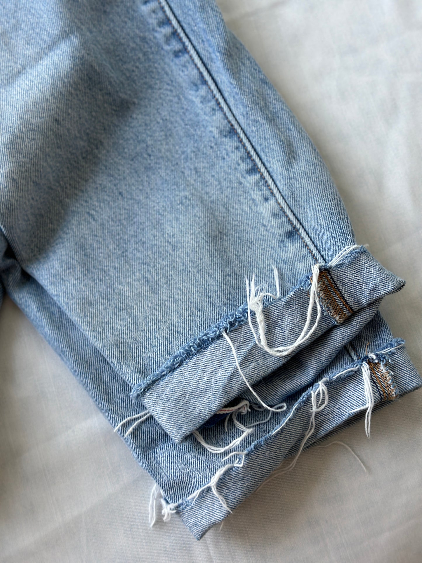 Levi ripped light blue jeans