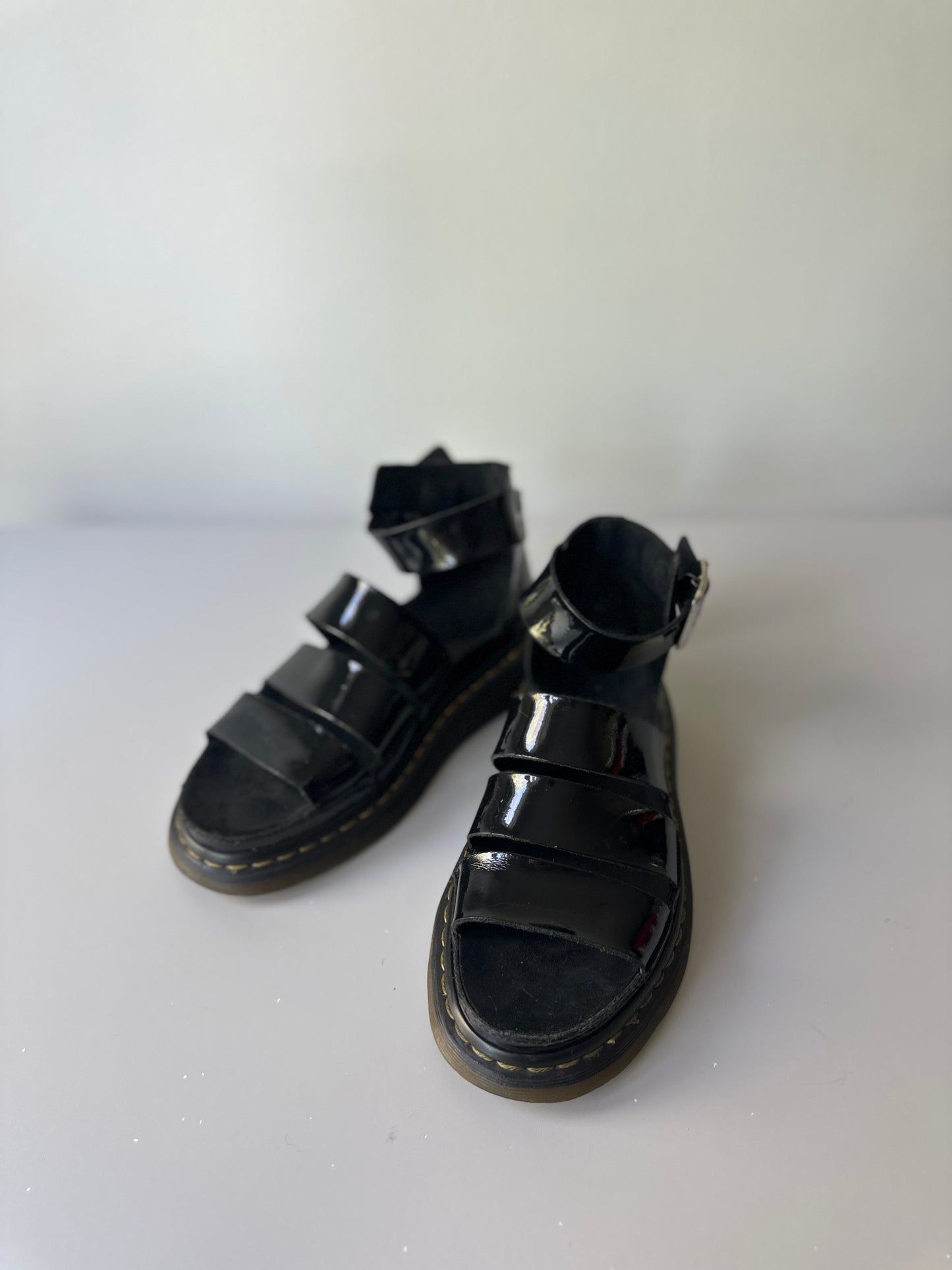 black patent Dr. Marten three strap sandals