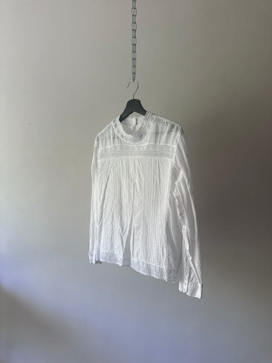 white embroidered cotton blouse