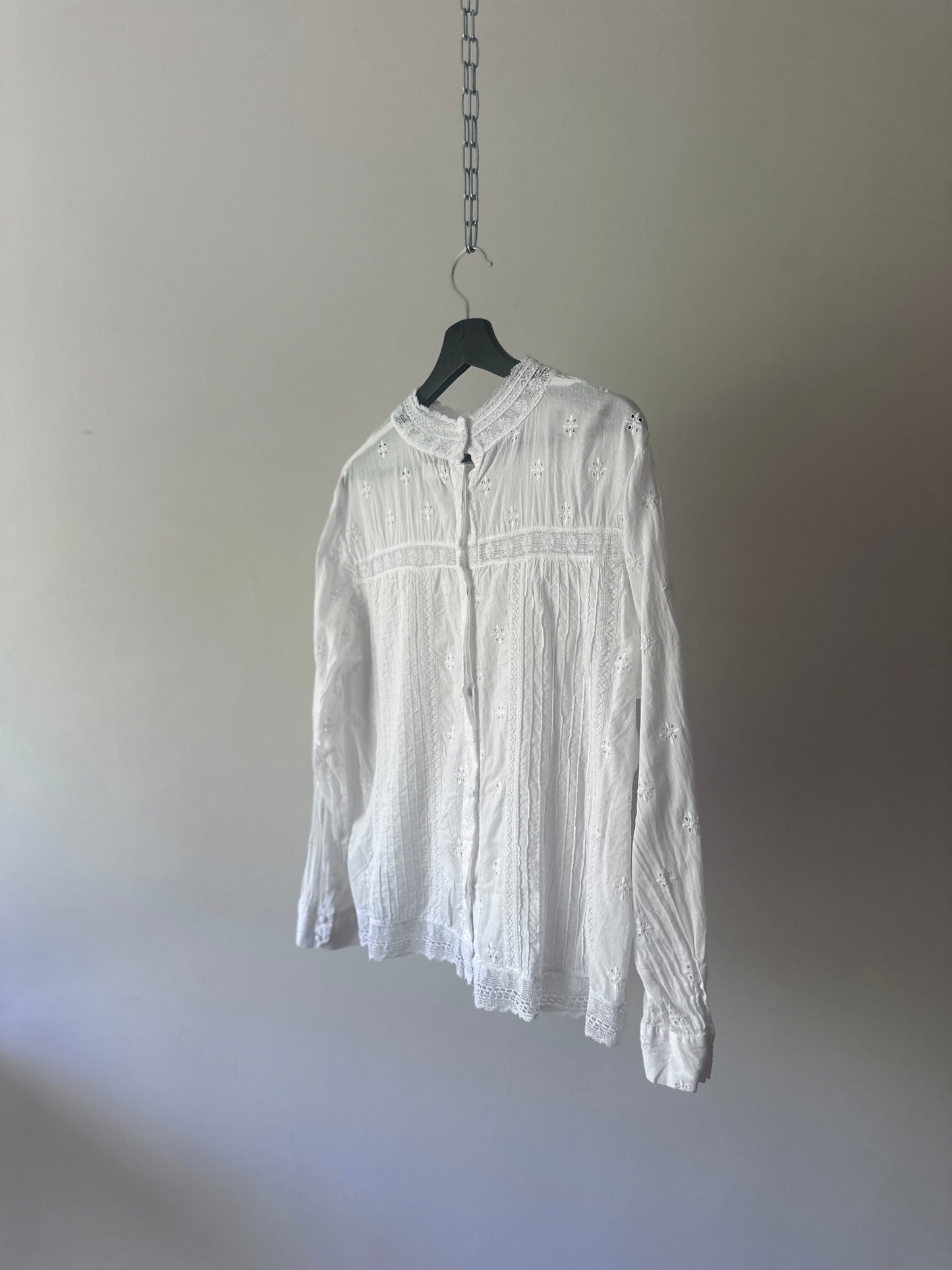 white embroidered cotton blouse