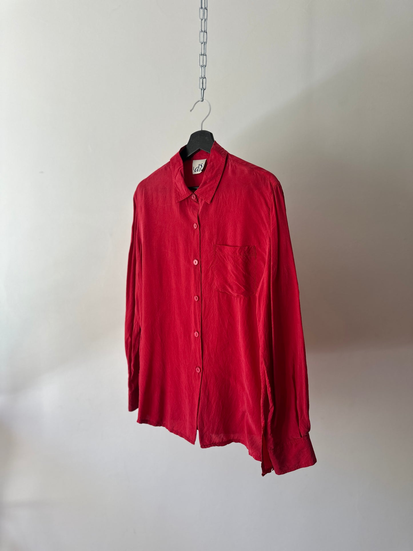 vibrant red silk shirt
