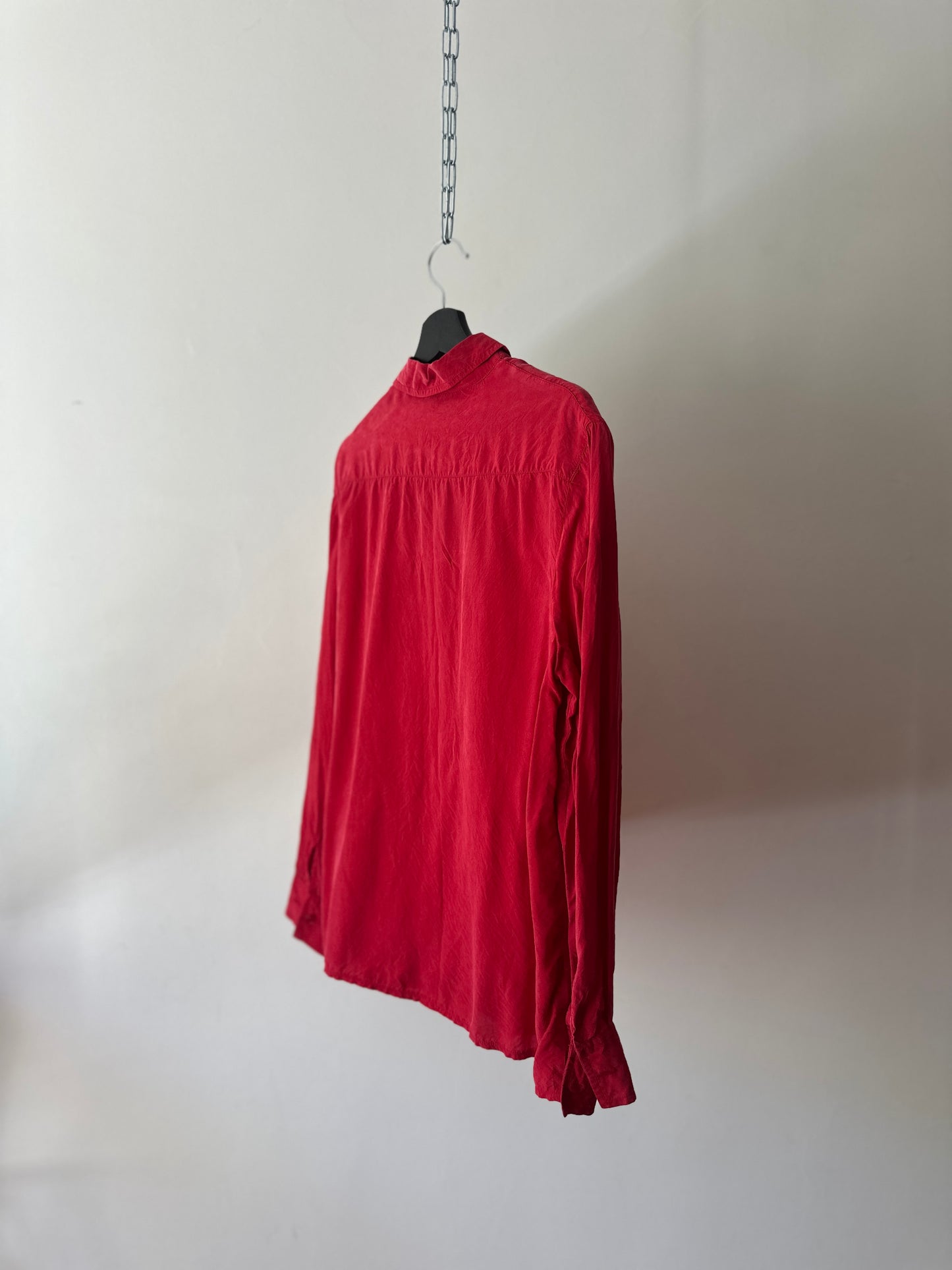 vibrant red silk shirt